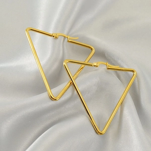 Polished 18k gold plated stainless steel geometric triangle hoop earrings on silk