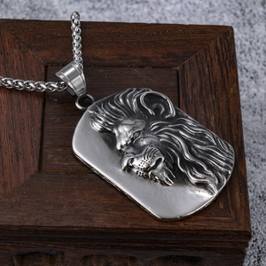 Vintage stainless steel lion head embossed rectangular pendant on a heavy braided chain
