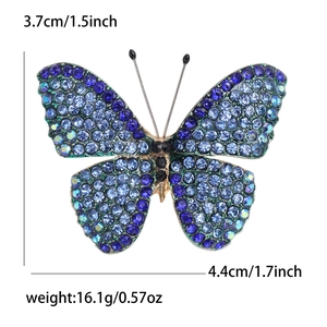 Elegant gold butterfly brooch with blue and purple crystals, size 4.4x3.7cm