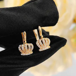 Elegant gold crown hoop earrings with white zircon stones for a luxury women's fashion style