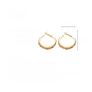 Detail view of gold alloy hoop earrings with amber rhinestones including size measurements