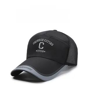 Detail of breathable mesh and high-quality embroidery on black sports baseball cap
