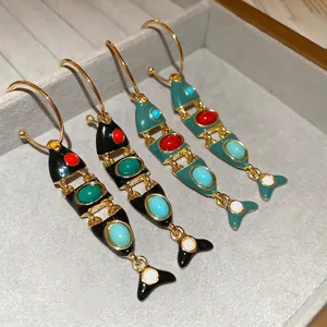 Artistic fish-shaped tassel hoop earrings with colorful enamel and movable joints