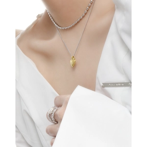 Elegant gold striped heart pendant necklace in S925 sterling silver layered with beads