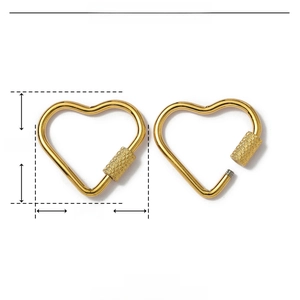 Macro detail of 24mm gold heart-shaped stainless steel carabiner clasp with measurements