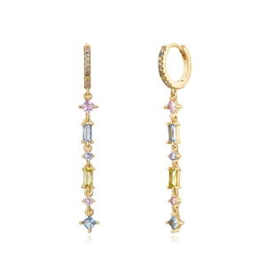 Elegant gold drop earrings with multicolored zircons and tassels on white background