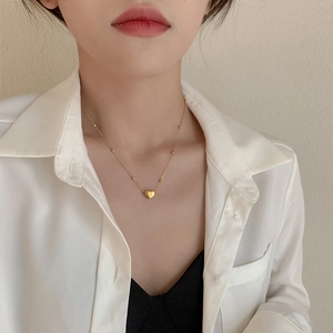 Elegant 18K gold plated heart pendant necklace with bead chain on female model