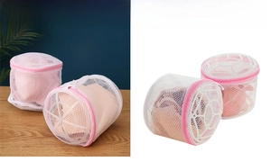 Macro detail of the reinforced mesh base and pink zipper on the cylinder laundry bag