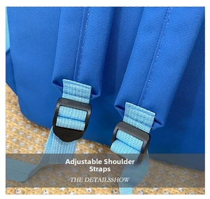 Close-up of adjustable shoulder straps with durable buckles on the blue kids backpack