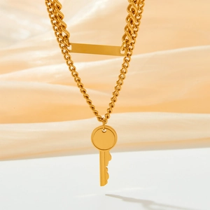 Double-layered gold stainless steel necklace with key pendant and rectangular bar tag
