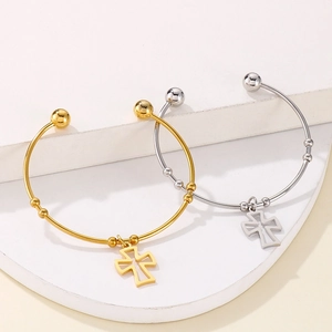 Minimalist stainless steel open bangles with cross charms in gold and silver finishes