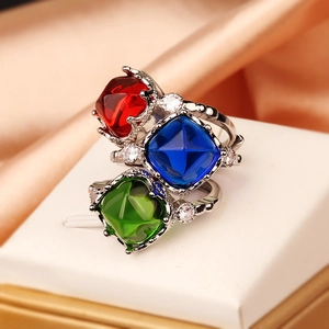 Luxurious silver open rings with square-cut red, blue, and green sapphire gemstones