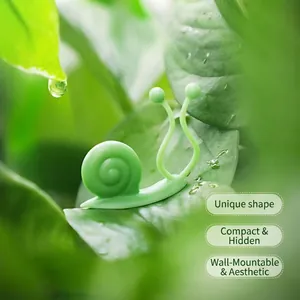 Cute green snail-shaped plant climbing wall fixtures shown on a natural green leaf background