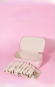 Pink leather jewelry organizer with zipper case and multiple individual storage pouches