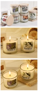 Detailed close-up of lavender scented candle in glass jar with a natural wooden lid
