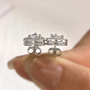 Macro shot of 925 silver moissanite stud earrings featuring halo setting craftsmanship