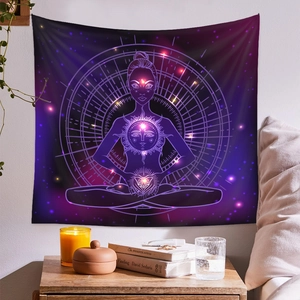Detailed close-up of a meditation tapestry with a spiritual design hanging on a cozy wall
