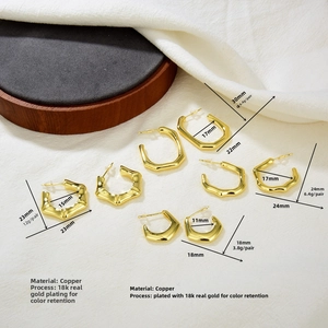 Detailed close-up of 18k gold plated copper earrings in geometric shapes with bamboo texture