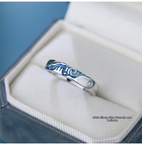 Macro shot of S925 silver ring featuring blue enamel starry night pattern and zircon