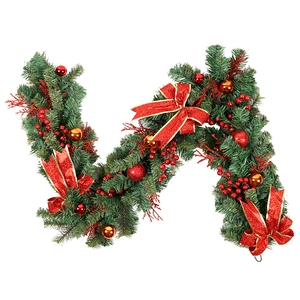 Green PVC Christmas garland with red bows, berries and gold ornaments on white background