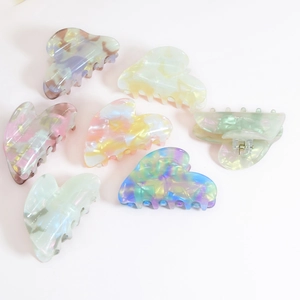 Assorted colorful pearlescent heart-shaped hair claws in retro Korean style for women