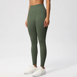 Close-up of olive green high-waisted seamless yoga pants with peach butt lifting design