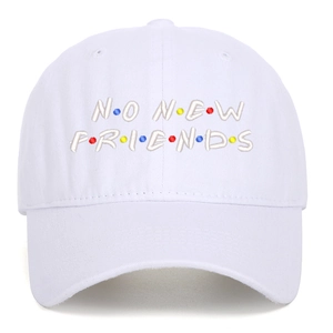 Detail shot of No New Friends embroidery and colorful dots on a white baseball cap