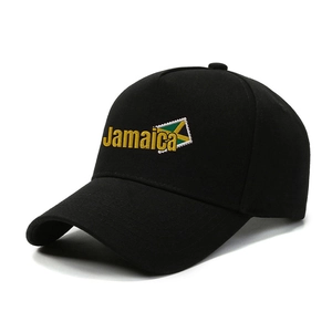 Detail of black cotton baseball cap with yellow Jamaica embroidery and flag stamp