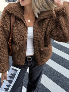Elegant women brown faux fur short jacket with stand collar and zipper on street