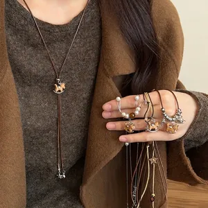 Tiger eye horse pendant pearl necklace with vintage wooden rocking horse charm
