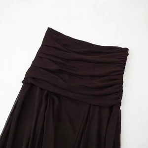 Deep chocolate brown chiffon maxi dress featuring waist pleats on a white background
