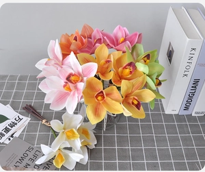 Macro shot of colorful 3D printed cymbidium orchids with realistic petal textures
