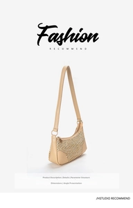 Close-up of beige woven underarm bag featuring leather patchwork and smooth zipper detail
