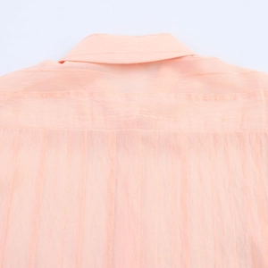 Detail view of pink striped blouse back yoke showing unique fabric texture and refined stitching