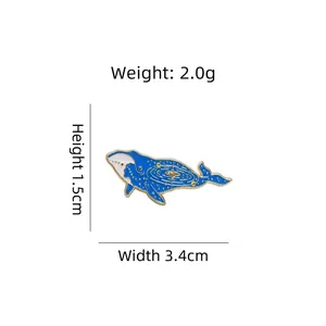 Blue whale enamel brooch with starry galaxy pattern and gold trim 3.4cm wide