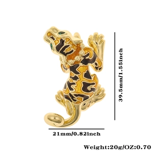 Detail view of gold and black leopard brooch with size and weight specifications