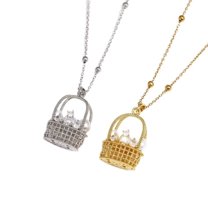 Elegant flower basket pearl pendant necklace in gold and silver finishes for women