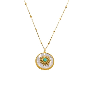 Gold stainless steel sunburst necklace with white shell pendant and turquoise bead