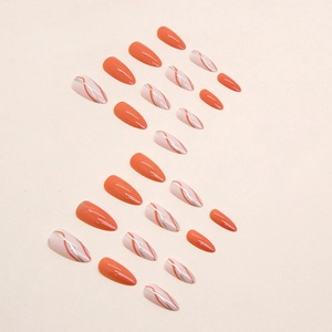 24pcs glossy almond press-on nails featuring orange and white abstract wave patterns