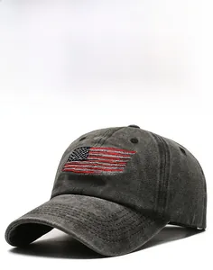 Close-up of vintage washed denim baseball cap with American flag and USA embroidery