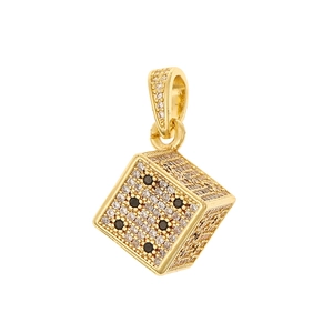 Close-up of a gold-plated dice pendant with sparkling black and white cubic zirconia