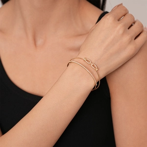 Elegant gold double-layered cuff bracelet with zircon pave links for women in a luxury style