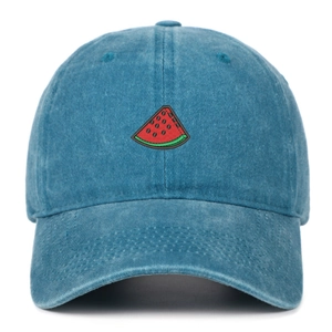 Close-up of a washed blue cotton baseball cap with a detailed watermelon slice embroidery