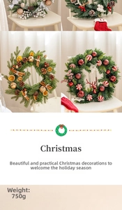 Detail of Christmas wreaths with pine cones and red berries for festive home decoration