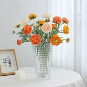 Artificial Persian Buttercup flowers in a textured glass vase for modern home decor