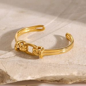 Polierter 18k vergoldeter Edelstahl Armreif mit verschlungenem Knoten Design für Damen