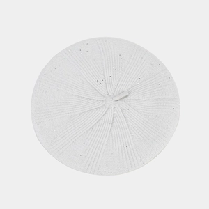 Top view showing detailed texture of white sequined knit beret with silver glitter