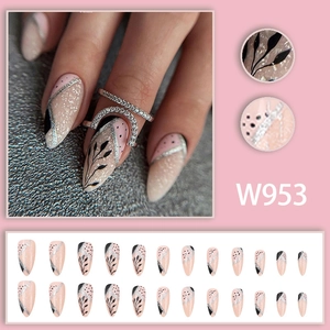 Pink and black almond press-on nails with leaf patterns and silver glitter lines