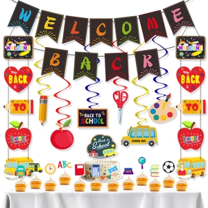 Detail of Welcome Back school party set with banner, spirals, and cake toppers