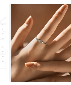 Close-up of S925 sterling silver square sugar ring with zircon stones on finger